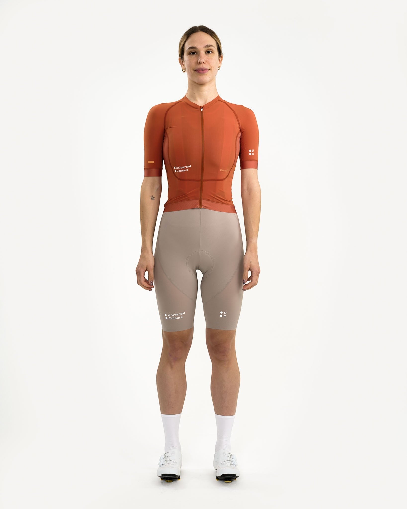 Moloko Cycling Ltd. women's Cyprus Copper short sleeve cycling jersey made from recycled polyester and Italian fabric with a full zip and three rear pockets.